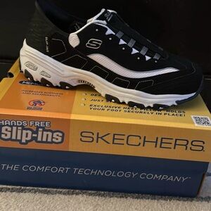 Skechers Black and White Athletic Slip-Ons